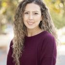 Headshot of Jennifer Magana smiling at the camera.